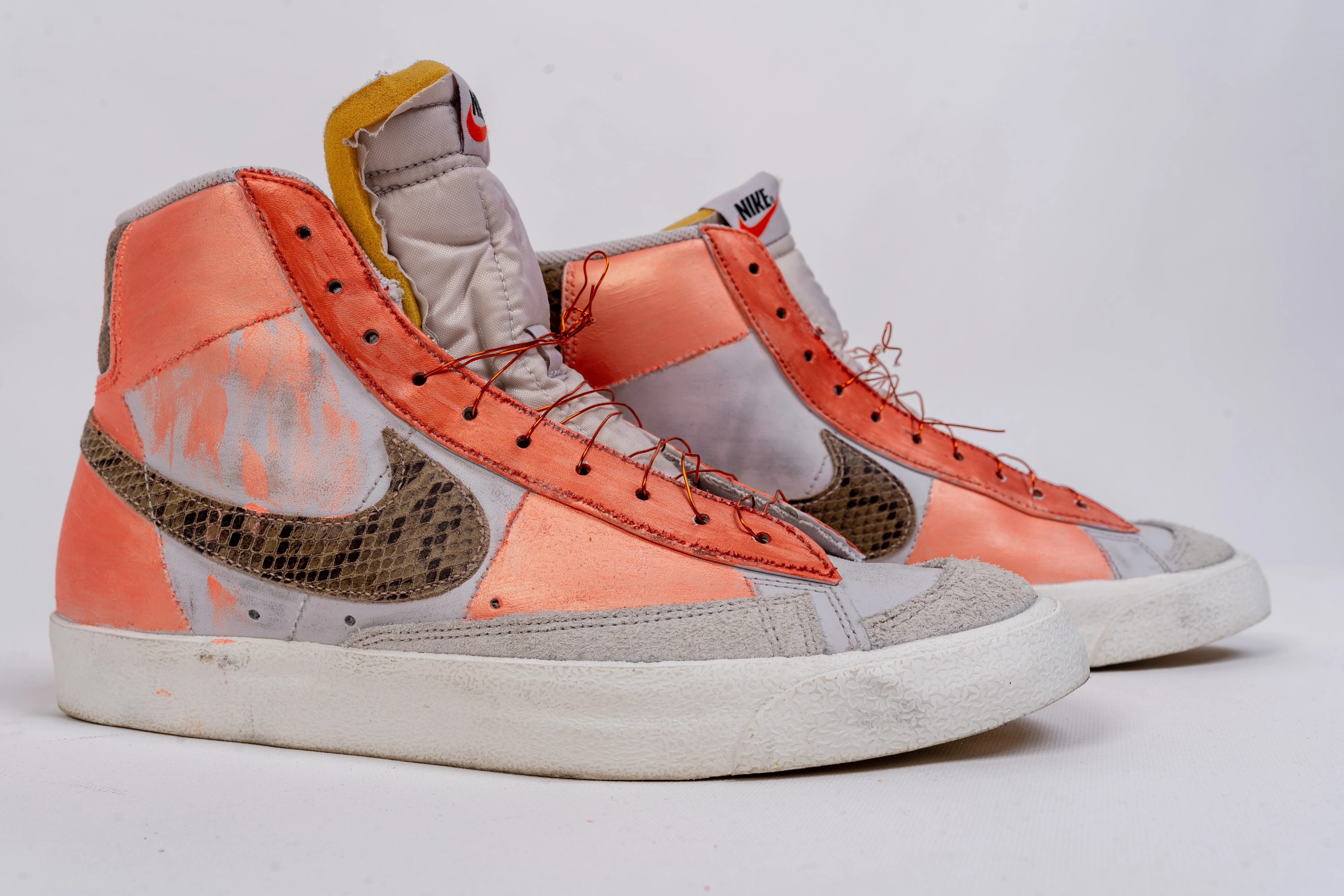Custom hand-painted white Nike Air Force 1 sneakers with colorful character art