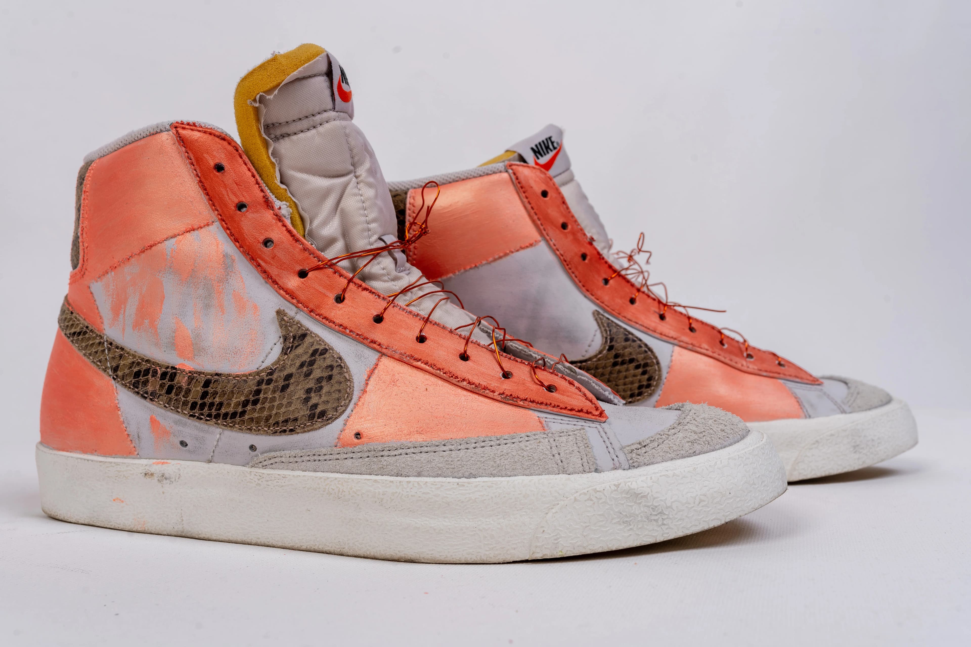 Custom hand-painted white Nike Air Force 1 sneakers with colorful character art
